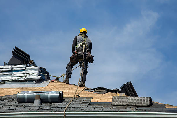 Professional Roof Replacement technician working in Leonard, ND